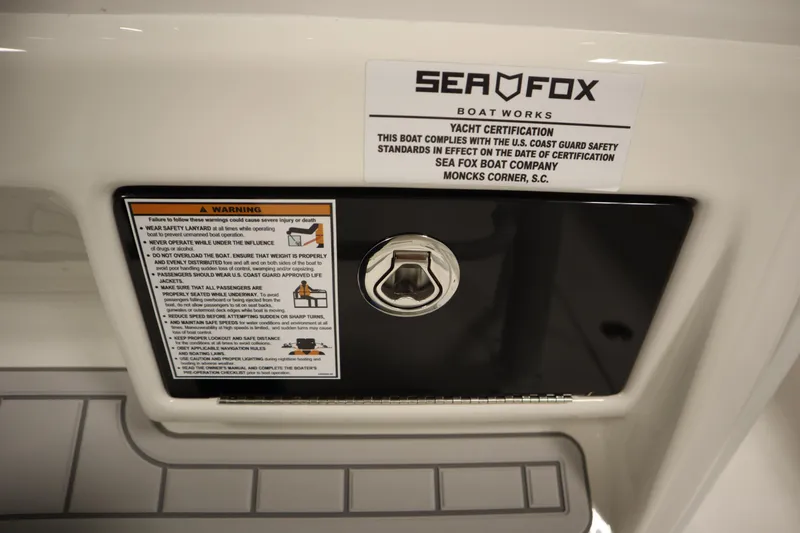 Slide: The Image of 2026 Sea Fox 268 Commander safety warning and certification label on boat interior. - 48