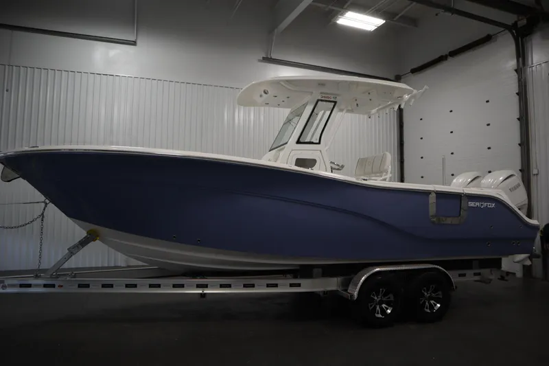 Slide: The Image of 2026 Sea Fox 268 Commander boat in indoor storage, side view. - 7