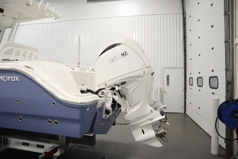 Slide: The Image of 2026 Sea Fox 268 Commander with Yamaha outboard in a garage setting. - 73