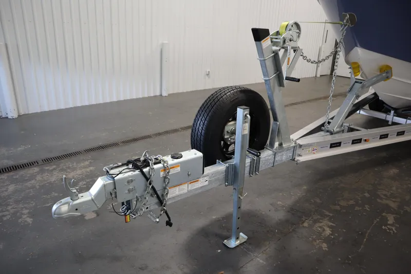 Slide: The Image of Trailer hitch and winch of 2026 Sea Fox 268 Commander boat in a garage. - 78