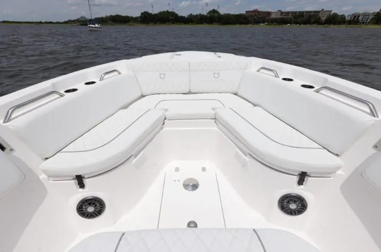 Slide: The Image of 2026 Sea Fox 268 Commander boat with spacious white seating on open water. - 89