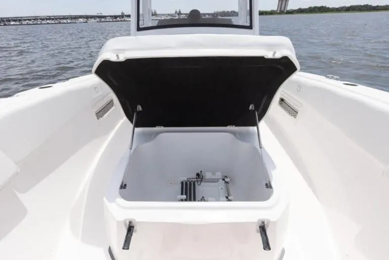 Slide: The Image of Open storage compartment on 2026 Sea Fox 268 Commander boat, with ocean view in background. - 91