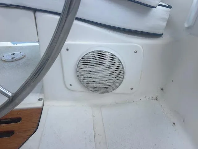 Slide: The Image of Cockpit of 1987 Hunter 35 sailboat with electrical connection and speaker. - 12