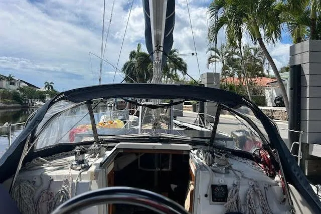 Slide: The Image of 1987 Hunter 35 boat cockpit with yellow power cable and speaker. - 15