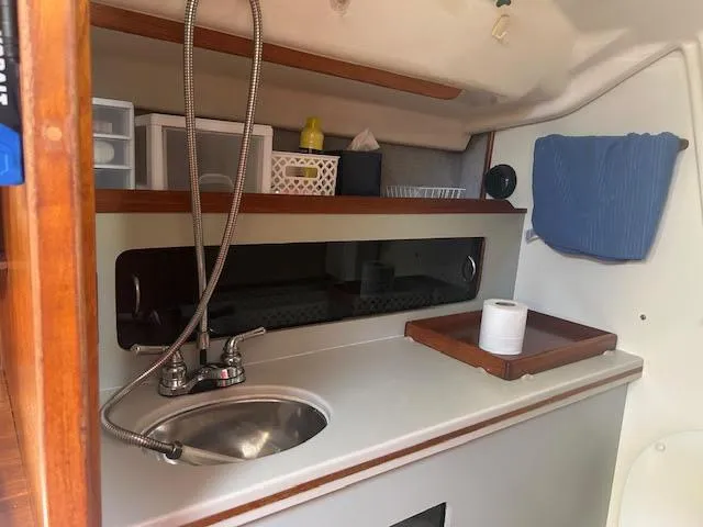 Slide: The Image of Raymarine display on 1987 Hunter 35 sailboat, showing wind angle and speed. - 20