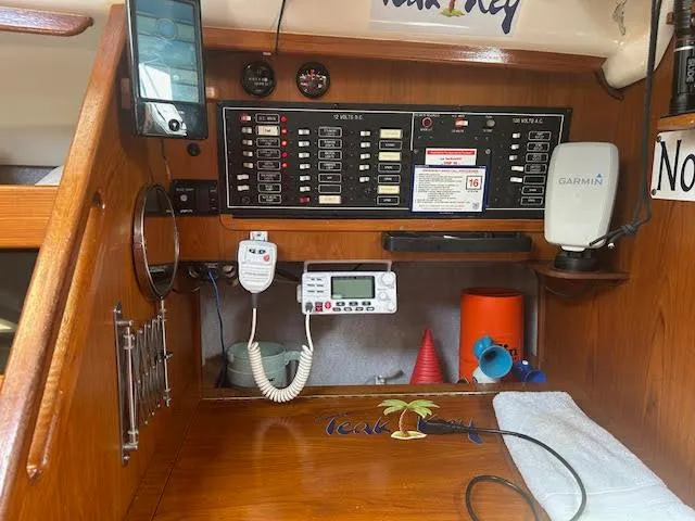 Slide: The Image of Control panel of a 1987 Hunter 35 sailboat with navigation equipment. - 26