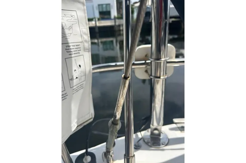 Slide: The Image of Close-up of a 1987 Hunter 35 sailboat's rigging and railing details. - 34