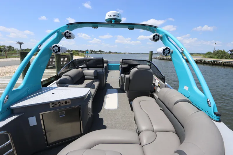 Slide: The Image of 2022 Tahoe Pontoon Grand Tahoe Twin Elite M2785 on a sunny day by the water. - 10
