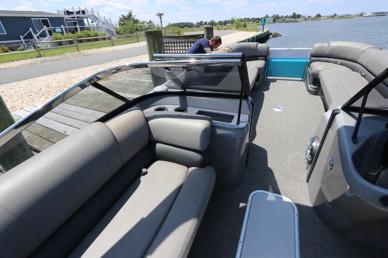 Slide: The Image of 2022 Tahoe Pontoon Grand Tahoe Twin Elite M2785 with spacious seating and sleek design. - 13