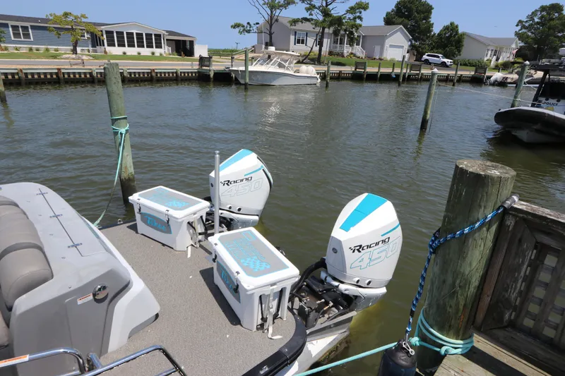 Slide: The Image of 2022 Tahoe Pontoon Grand Tahoe Twin Elite M2785 with dual Racing 450 engines docked. - 7