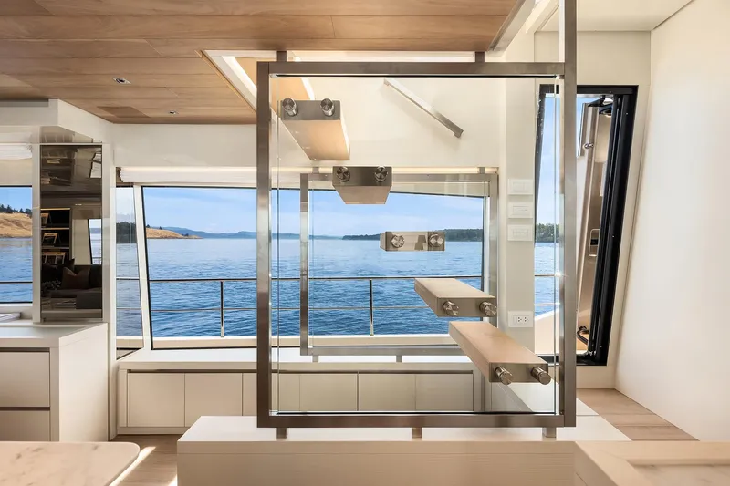 Slide: The Image of Modern interior of 2023 Sanlorenzo SL86 yacht with sleek staircase and ocean view. - 7