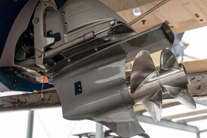 Slide: The Image of Close-up of a 2013 Regal 2700 ES Bowrider's Volvo Penta outdrive and propeller. - 10