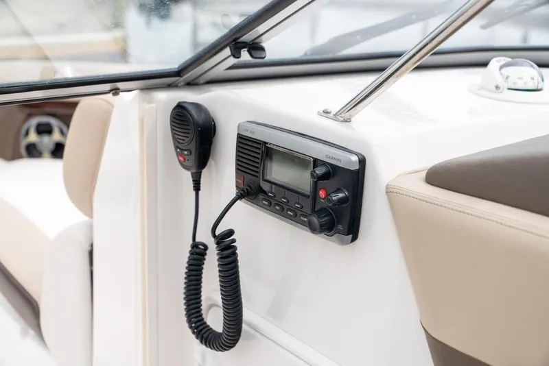 Slide: The Image of 2013 Regal 2700 ES Bowrider interior with Garmin radio and microphone. - 6