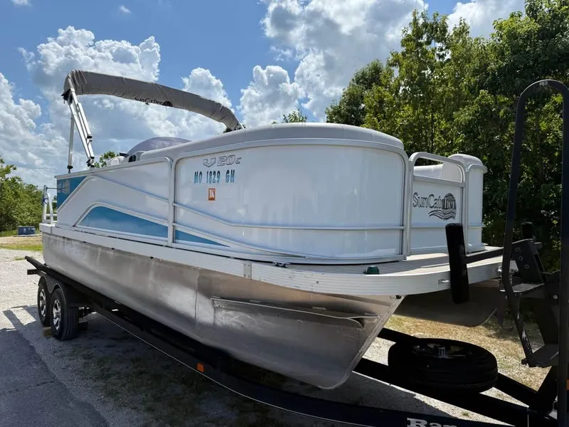 Slide: The Image of 2018 G3 V20C pontoon boat on trailer under a cloudy sky. - 3