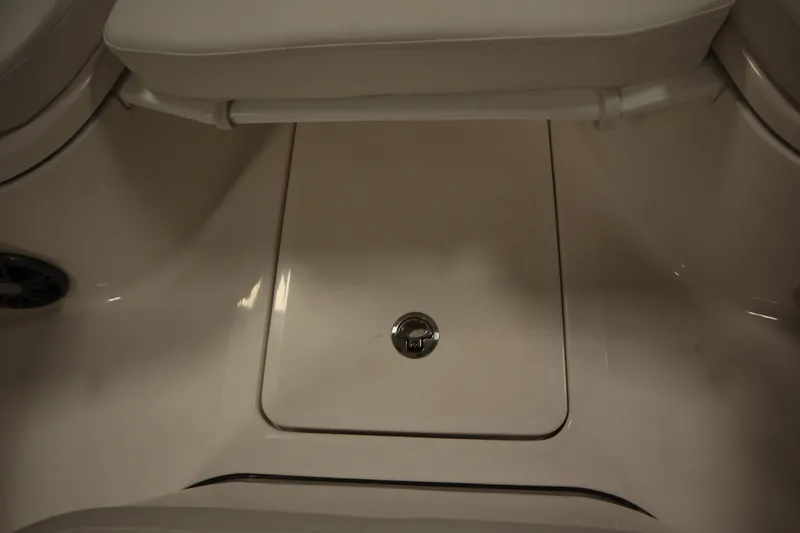 Slide: The Image of 2026 Sea Fox 248 Commander boat storage compartment with cushioned seating. - 15