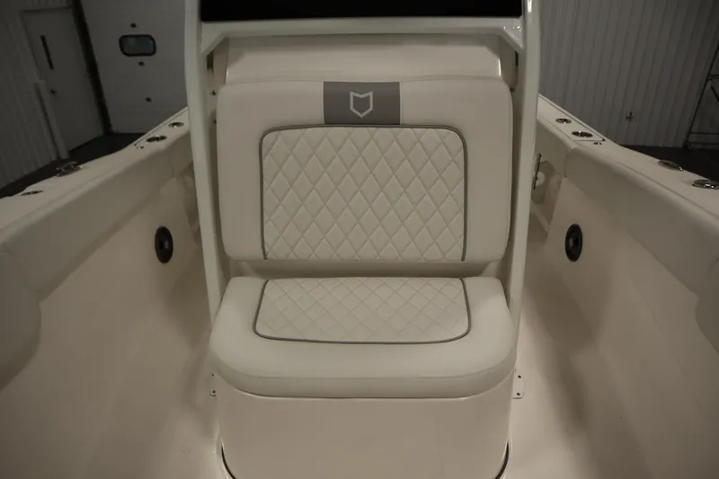 Slide: The Image of 2026 Sea Fox 248 Commander boat seat with diamond-patterned upholstery. - 17