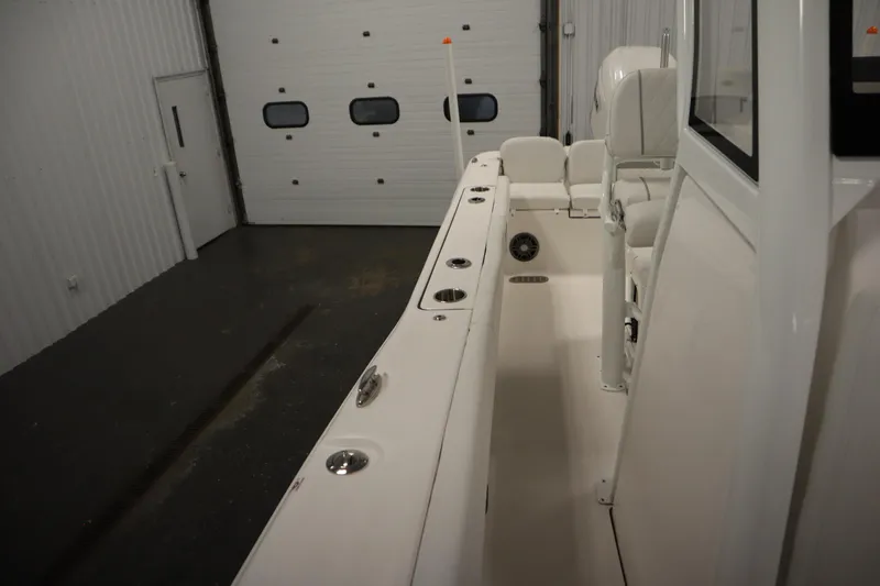 Slide: The Image of 2026 Sea Fox 248 Commander boat interior in a garage setting. - 22