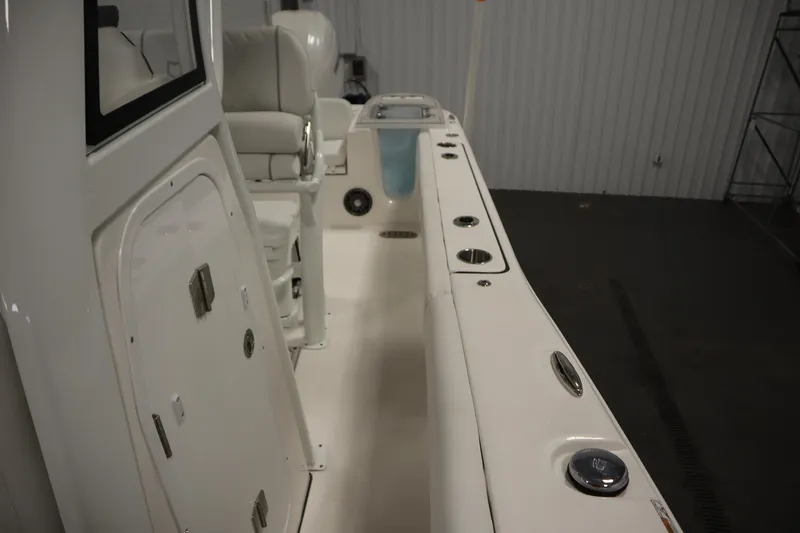 Slide: The Image of 2026 Sea Fox 248 Commander boat interior with seating and storage compartments. - 23