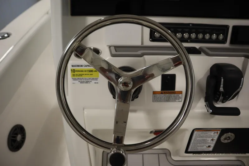 Slide: The Image of Steering wheel and controls of 2026 Sea Fox 248 Commander boat. - 26