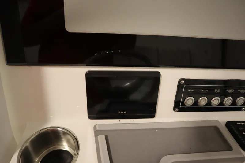 Slide: The Image of 2026 Sea Fox 248 Commander dashboard with Yamaha display and control panel. - 30