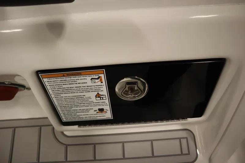 Slide: The Image of 2026 Sea Fox 248 Commander boat warning label and compartment detail. - 34