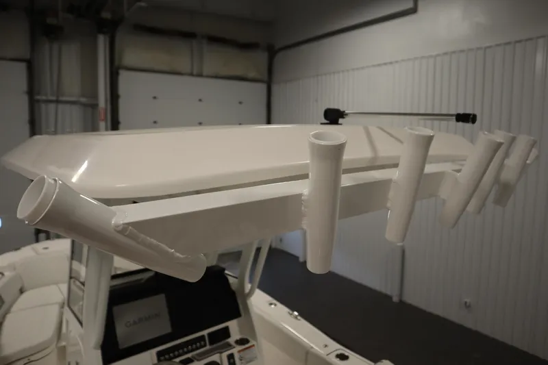 Slide: The Image of 2026 Sea Fox 248 Commander boat with rod holders and Garmin electronics. - 40