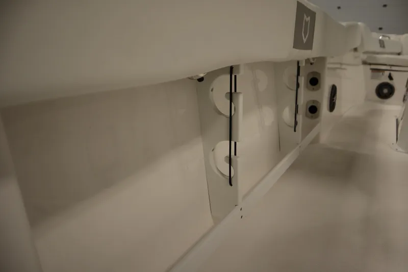 Slide: The Image of 2026 Sea Fox 248 Commander interior detail showcasing storage compartments and design features. - 42