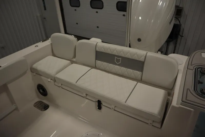 Slide: The Image of 2026 Sea Fox 248 Commander boat interior with cushioned seating and modern design. - 48