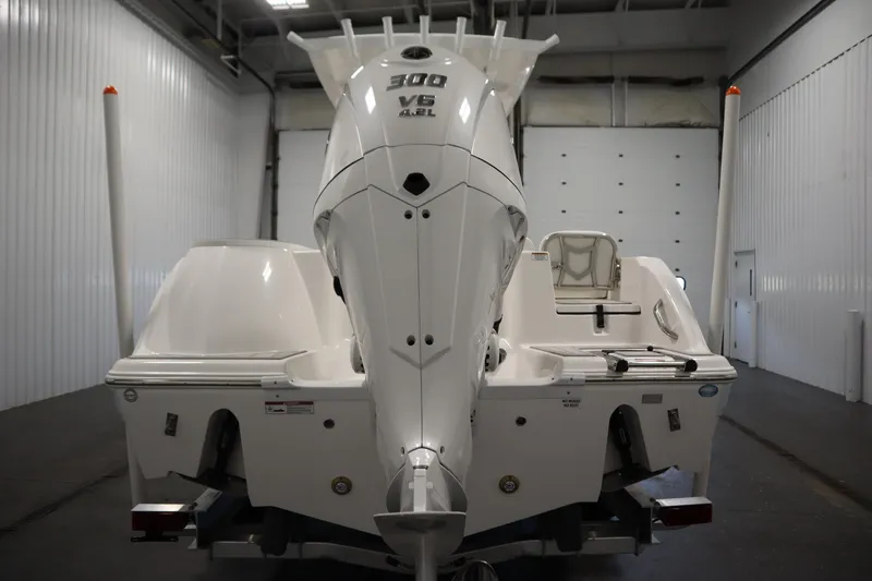 Slide: The Image of 2026 Sea Fox 248 Commander boat in a storage facility, rear view. - 5
