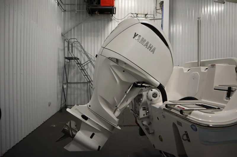 Slide: The Image of 2026 Sea Fox 248 Commander with Yamaha outboard engine in a storage facility. - 53