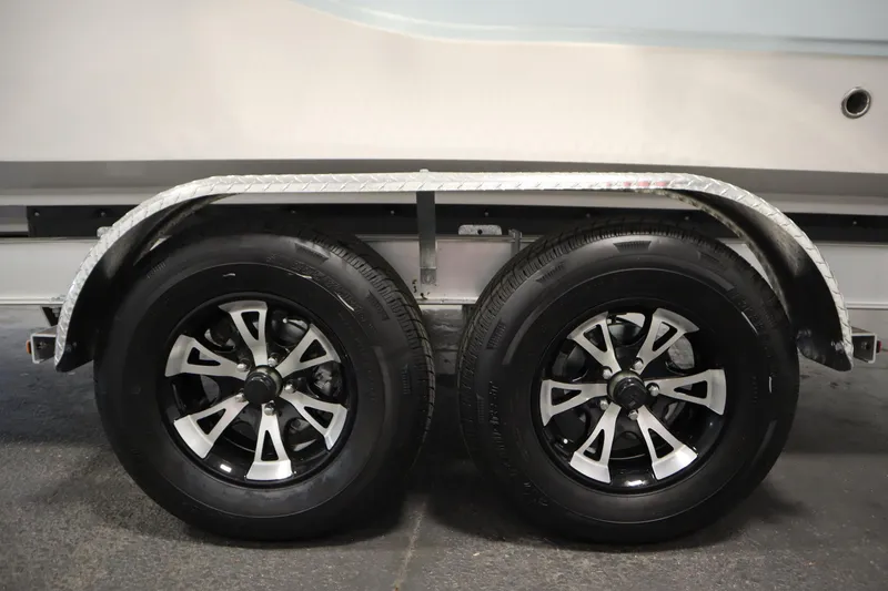 Slide: The Image of 2026 Sea Fox 248 Commander trailer wheels with stylish black and silver rims. - 59
