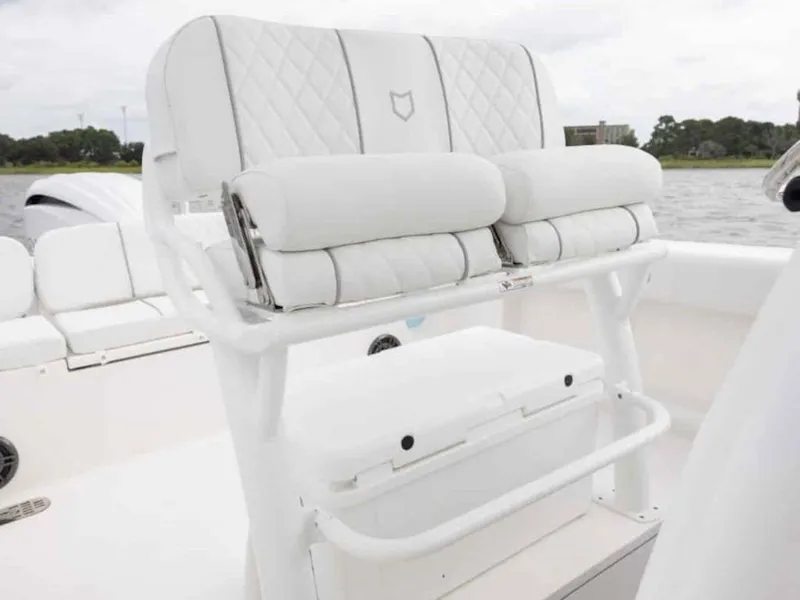 Slide: The Image of 2026 Sea Fox 248 Commander boat with white cushioned seating and storage. - 74