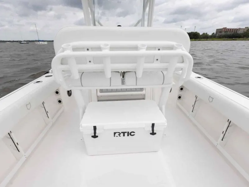 Slide: The Image of 2026 Sea Fox 248 Commander boat interior with RTIC cooler on deck. - 76