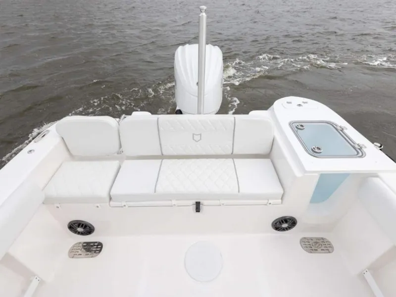 Slide: The Image of 2026 Sea Fox 248 Commander boat interior with white seating and water view. - 80