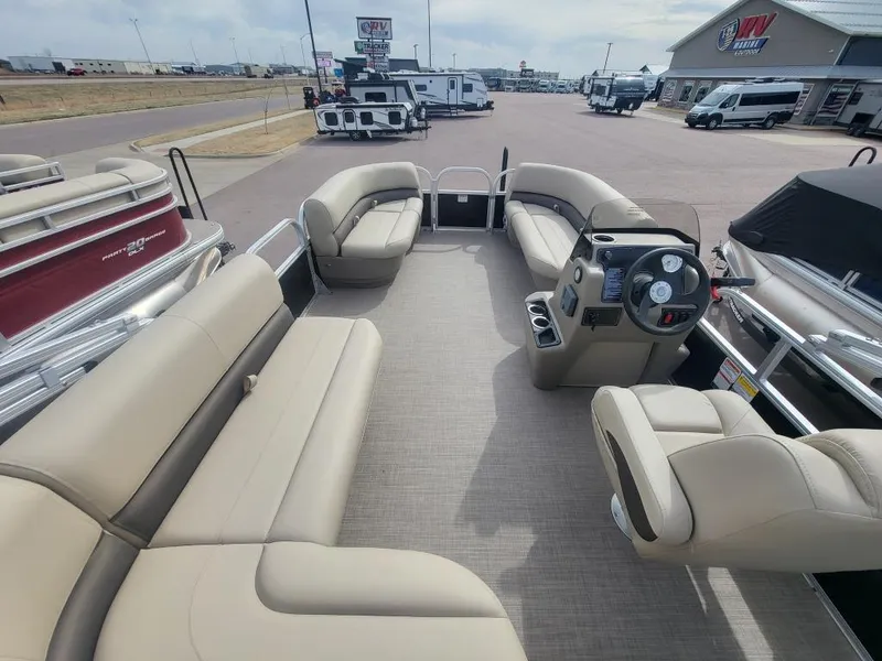 Slide: The Image of 2025 Sun Tracker Party Barge 16 DLX pontoon boat with spacious seating and modern helm. - 14