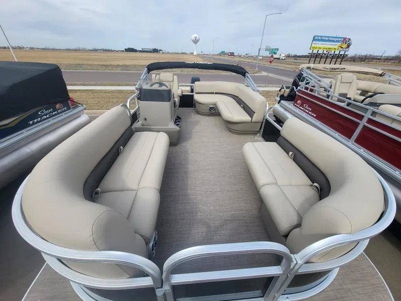 Slide: The Image of 2025 Sun Tracker Party Barge 16 DLX pontoon boat with spacious seating and modern design. - 17