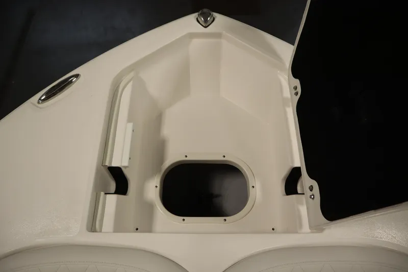 Slide: The Image of 2026 Sea Fox 228 Commander boat interior, featuring a storage compartment and sleek design. - 12