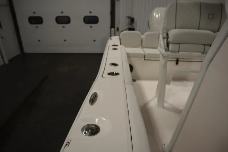 Slide: The Image of 2026 Sea Fox 228 Commander boat interior with seating and rod holders. - 21