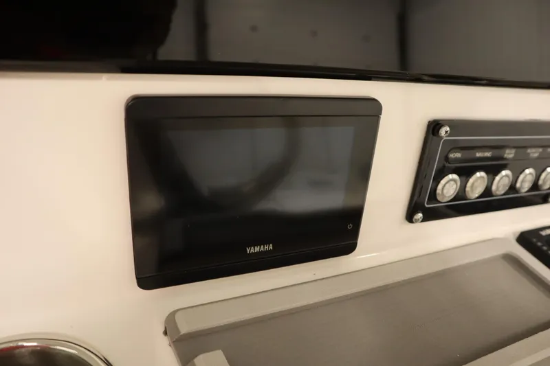 Slide: The Image of Dashboard of 2026 Sea Fox 228 Commander with Yamaha display and control panel. - 31
