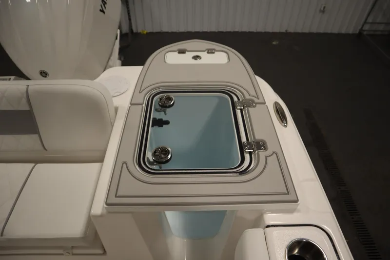 Slide: The Image of 2026 Sea Fox 228 Commander boat with open storage compartment and seating area. - 41
