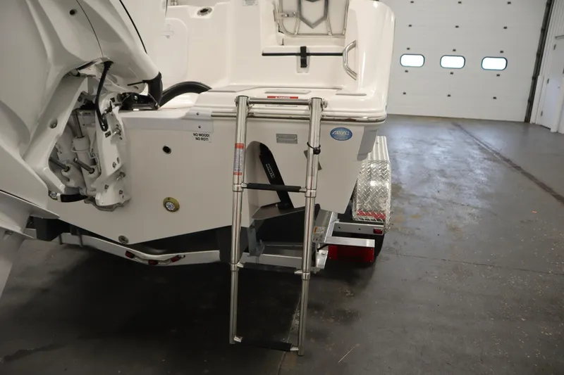 Slide: The Image of 2026 Sea Fox 228 Commander boat with ladder and trailer in a garage. - 50