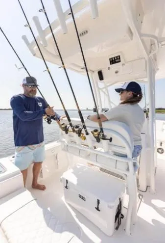 Slide: The Image of Two people fishing on a 2026 Sea Fox 228 Commander boat. - 66