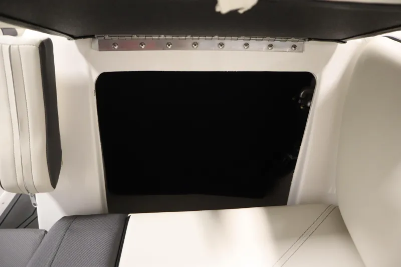 Slide: The Image of Interior view of 2025 Heyday WT Surf boat storage compartment with seating. - 11