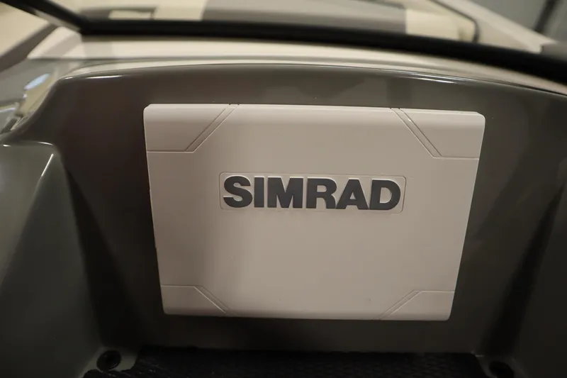 Slide: The Image of Simrad device on 2025 Heyday WT Surf boat dashboard. - 18