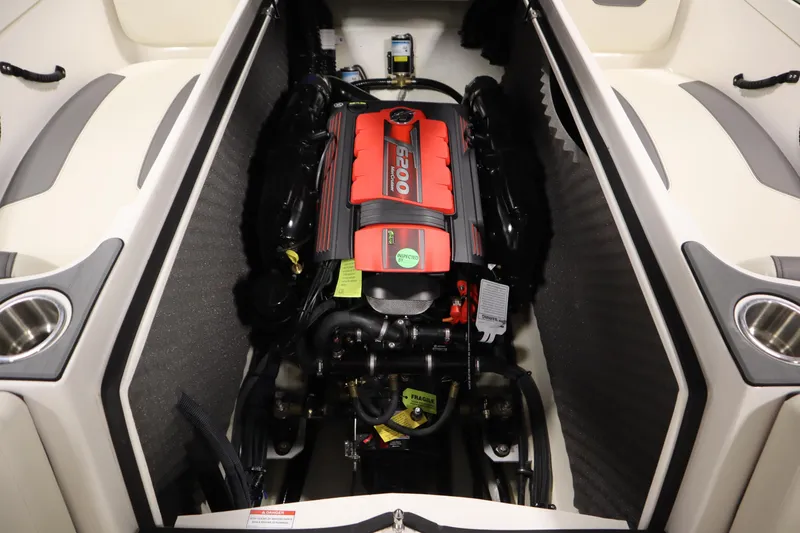 Slide: The Image of Engine compartment of 2025 Heyday WT Surf boat, featuring a powerful 6200 engine. - 34