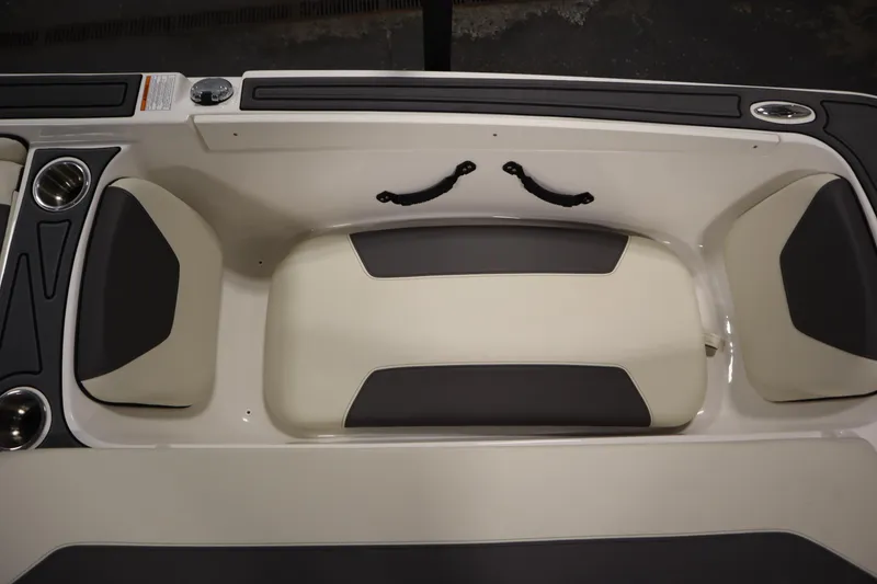Slide: The Image of 2025 Heyday WT Surf boat interior with cushioned seating and cup holders. - 37