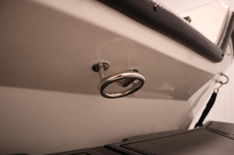 Slide: The Image of Close-up of 2025 Heyday WT Surf boat's metal cleat on the hull. - 40