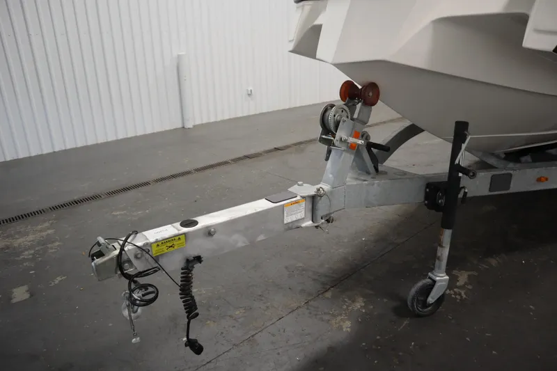 Slide: The Image of Trailer hitch of 2025 Heyday WT Surf boat in a garage setting. - 42