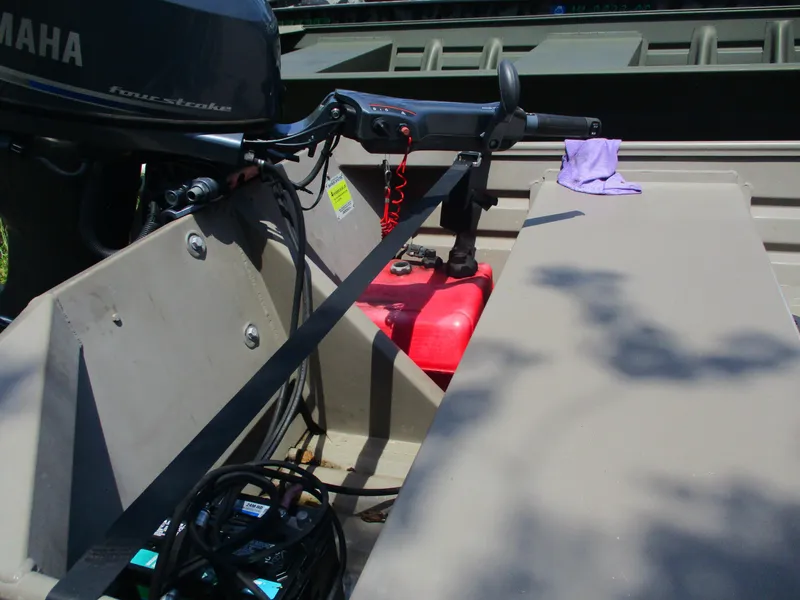 Slide: The Image of 2023 Alweld 1648SS boat interior with Yamaha four-stroke motor and red fuel tank. - 6