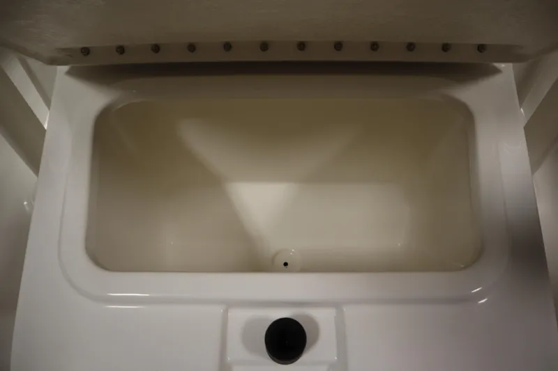 Slide: The Image of 2026 Bayliner 20 Cc Trophy boat storage compartment, interior view. - 15